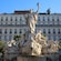 A monumental fountain in a city square